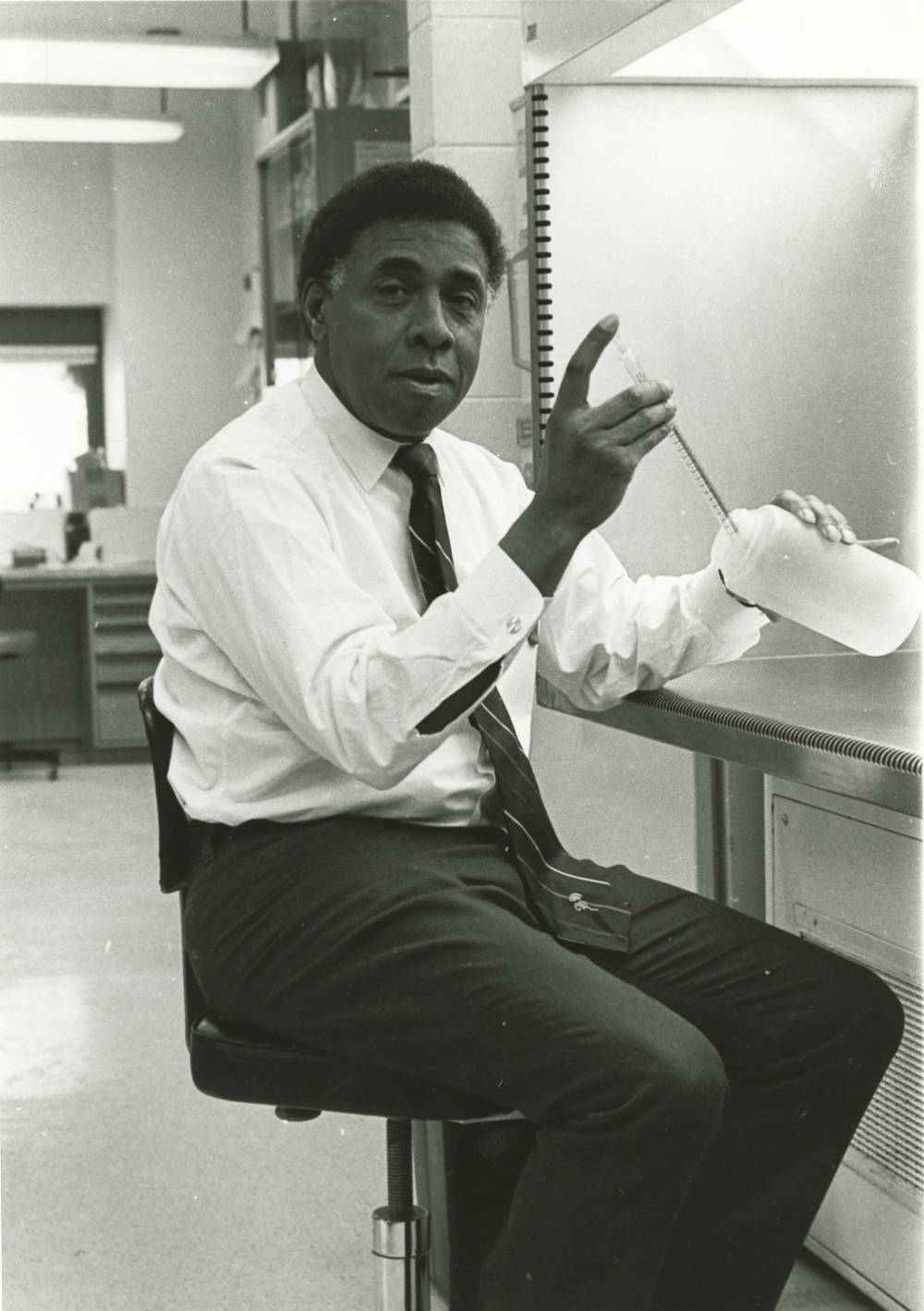 Harold Amos working in the laboratory